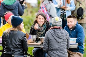 UW-Madison students enjoy a group dinner event at the Eagle Heights Community Gardens at the University of Wisconsin-Madison on Oct. 16, 2015. (Photo by Bryce Richter / UW-Madison)