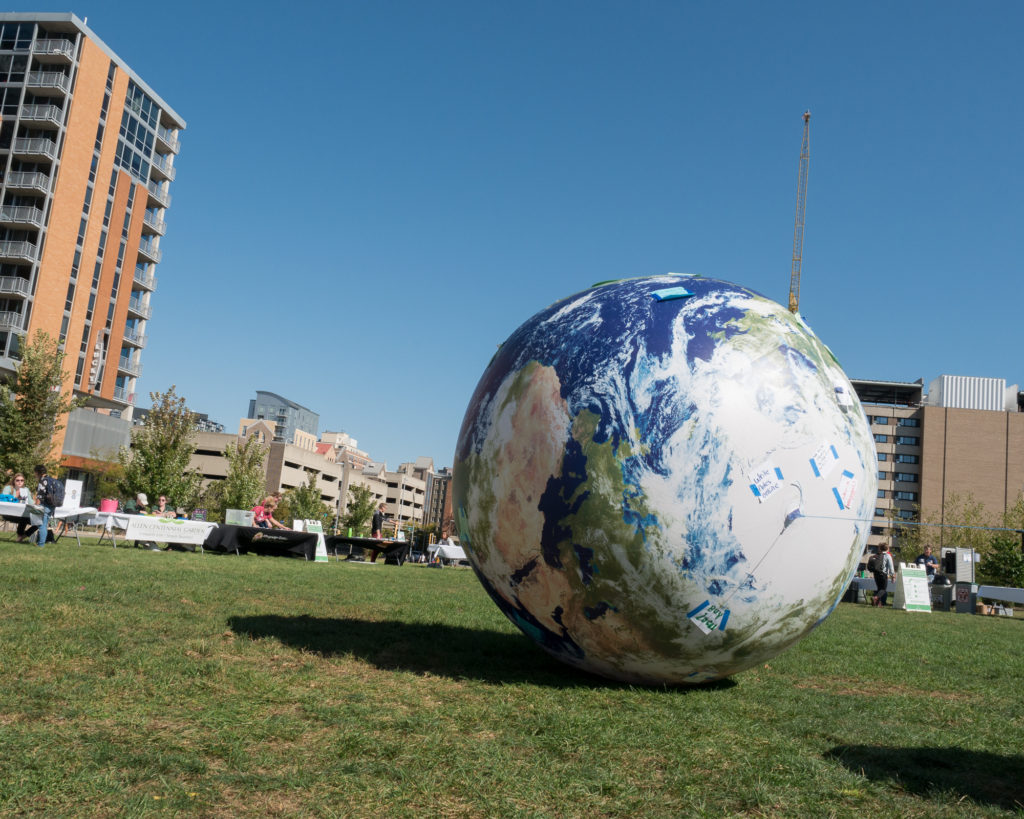 A giant earth rolls around the Gordon Lawn during Sustain-A-Bash, Fall 2017. 