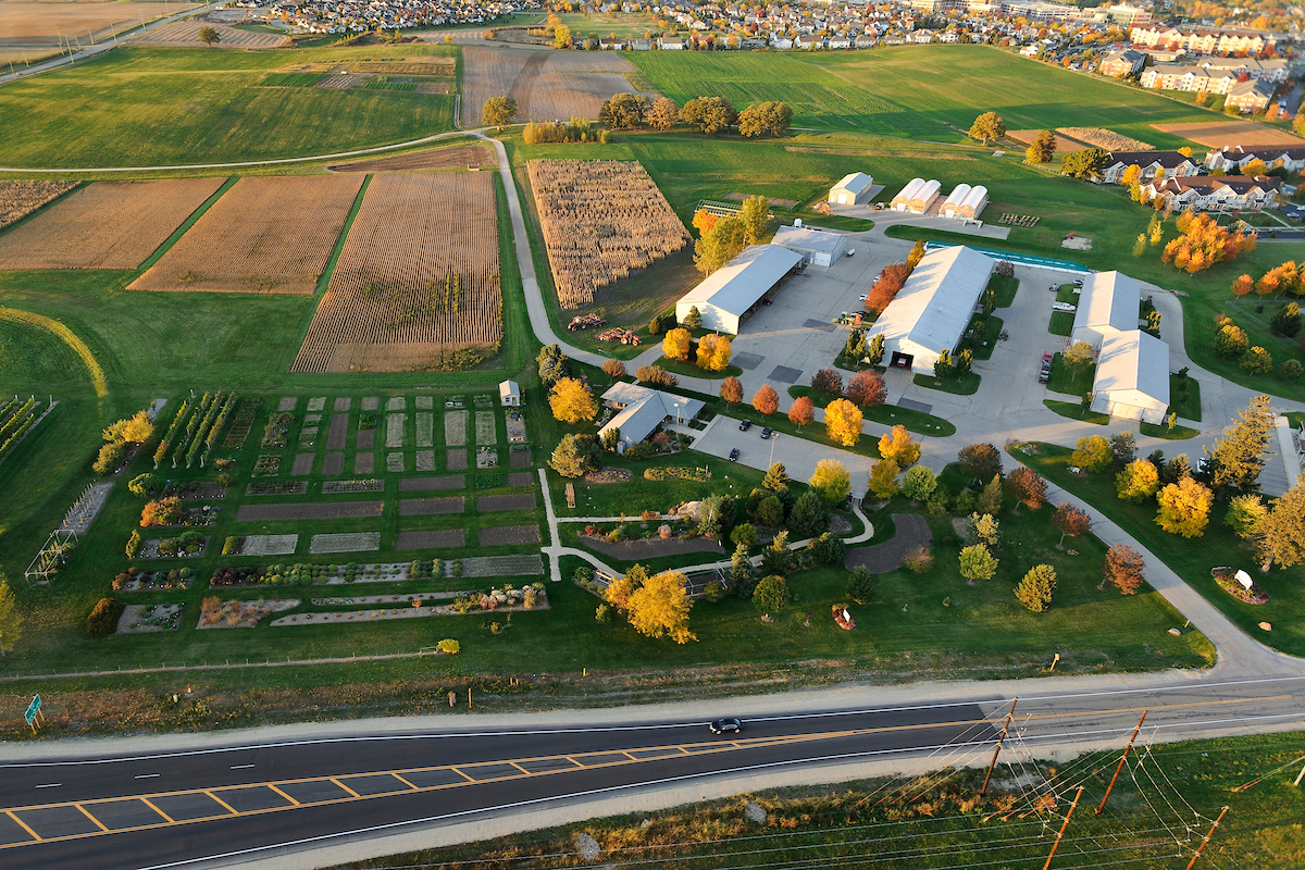 The West Madison Agricultural Research Station is pictured in an aerial view of the University of Wisconsin-Madison campus during an autumn sunset. Photo by Jeff Miller/UW-Madison.