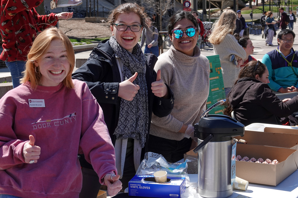 Office of Sustainability interns having fun and serving treats from Bloom Bake Shop during Fix-It Friday.