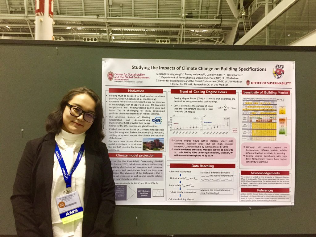 Gesang standing by her research poster at a conference